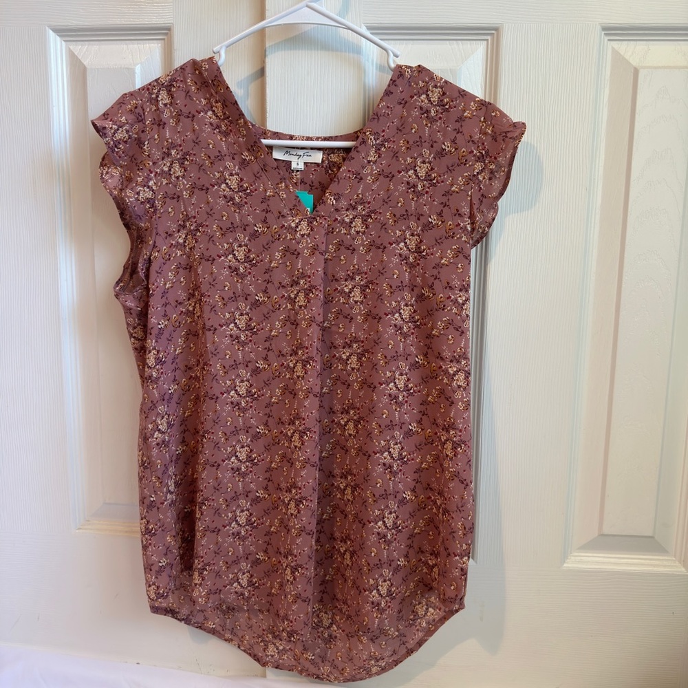 A cute pink floral pattern blouse